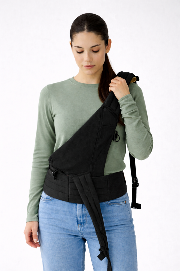 Fasten one shoulder strap.